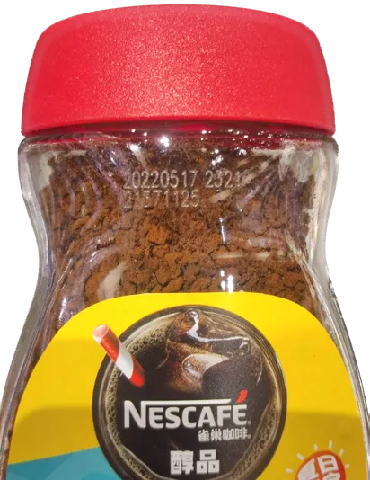 Codificado láser CO2 en etiqueta de frasco de café